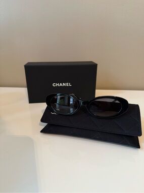 CHANEL Women's Black Oval Sunglasses - Classic Designer Shades, 5565S